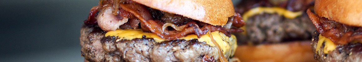 Eating Burger at Grindhouse Killer Burgers restaurant in Atlanta, GA.